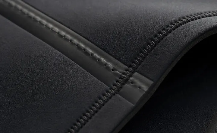 Close-up of premium wetsuit seam construction